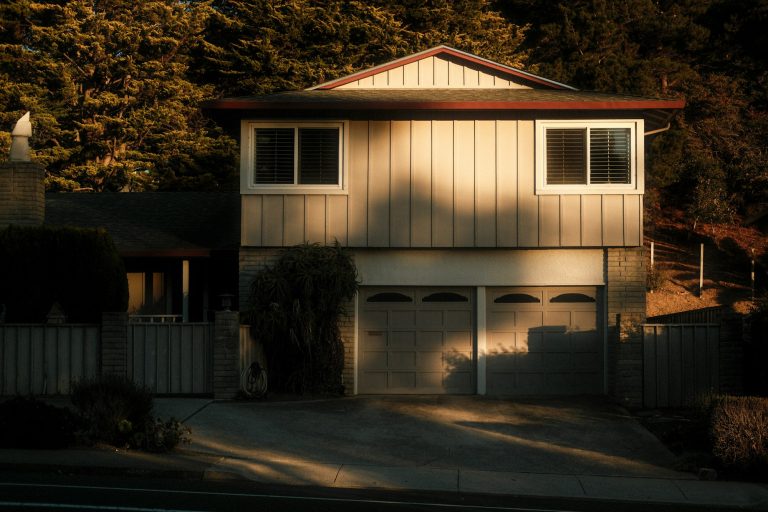 Two-story suburban home in warm evening light